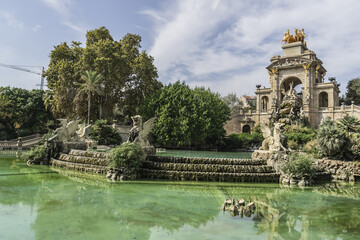 Fototapeta na wymiar View of Cascada at Parc de la Ciutadella - a triumphal arch with waterfall and fountain built for 1888 Universal exhibition. Barcelona. Spain.