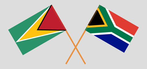 Crossed flags of Guyana and Republic of South Africa. Official colors. Correct proportion