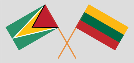 Crossed flags of Guyana and Lithuania. Official colors. Correct proportion