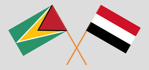 Crossed flags of Guyana and Yemen. Official colors. Correct proportion