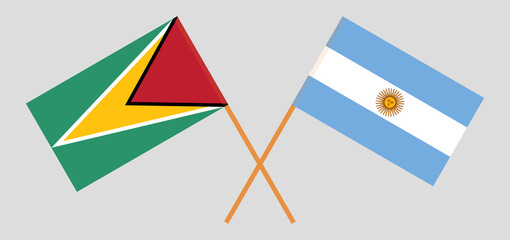 Crossed flags of Guyana and Argentina. Official colors. Correct proportion