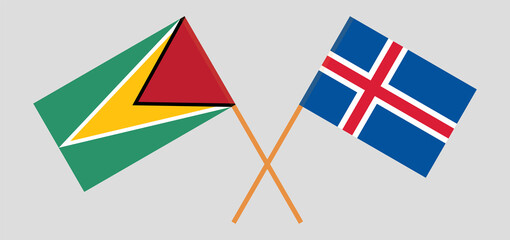 Crossed flags of Guyana and Iceland. Official colors. Correct proportion