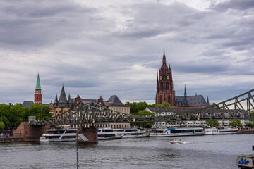 Fototapeta premium FRANKFURT, GERMANY, 25 JULY 2020: View on the financial district with Main river in Frankfurt city