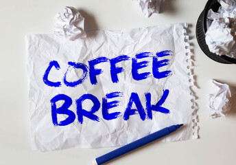 Let's Take A Coffee Break written on a sketch book