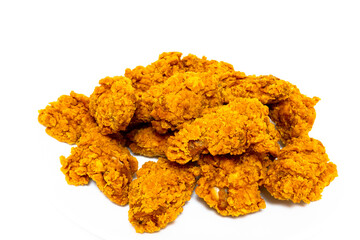 Deep fried spicy chicken wings in a crispy breading, chicken fast food isolated on white background