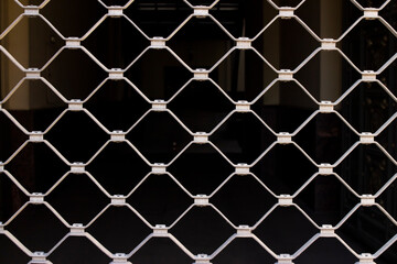 metal grid background, automatic garage fence, texture