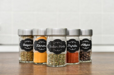 Glass jars with different spices
