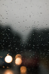 Behind a window on a rainy day