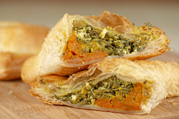 Freshly baked spinach triangle pastry with danish feta and roasted pumpkin.