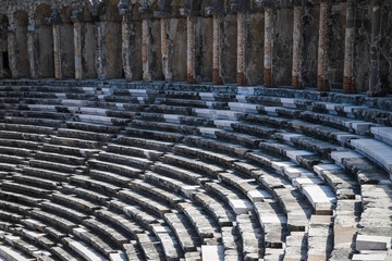 Aspendos Amphitheater close-up inside in the summertime with sunshine, Turkey, Serik.