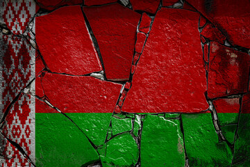 National flag of Belarus. depicting in paint colors on an old stone wall. Flag  banner on broken  wall background.