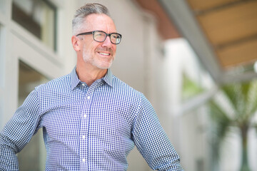 Mature handome fit man sitting outside stock photo