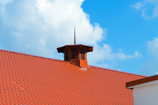 Ventilation outlet with lightning rod on the roof of decorative tiles