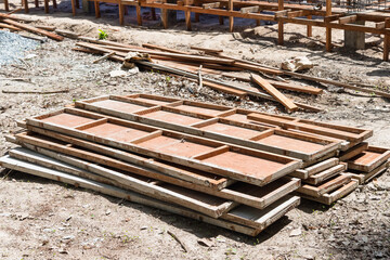 The bundle of wooden molds used for pouring concrete or cement of a house foundation or pole.