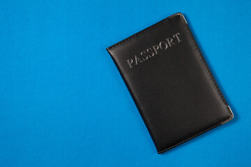 Passport on the blue background. Minimalism style. The concept of Travel and Holidays.