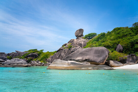 Sailing rock clift, natural unseen landmark of Similan island, Andaman sea. With beautify environment scene of emerald turquoise water and clearly blue sky. Travel destination in Thailand. 