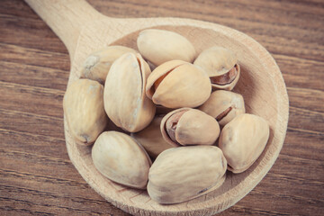Fototapeta premium Pistachio nuts containing vitamins and minerals. Healthy eating