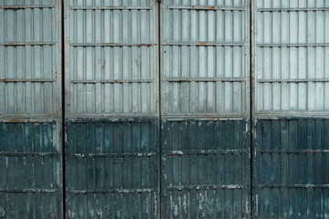 old industrial green gray metal door wall background