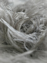 Macro photo of grey carpet fibers