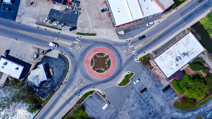Aerial shot of a roundabout surrounded by buildings in Eden, NC, the USA