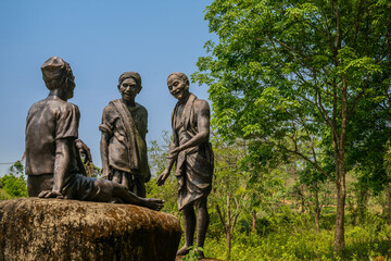 Person in the woods. Statue of Lachit Borphukan in Jorhat Assam. A memorial honouring General Lachit Borphukan. Near Kaziranga national park, Northeast India.
