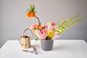 Finished flower arrangement in a vase for home. Flowers bunch, set for interior. Fresh cut flowers...