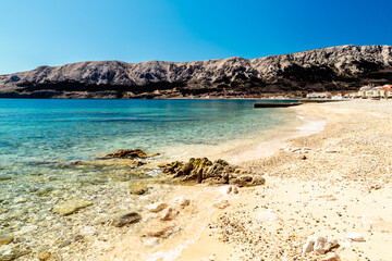 The bay of Baska in a sunny day