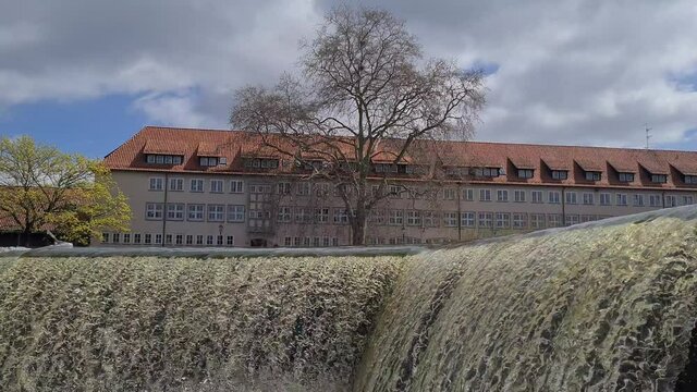 Waterfall on river Weser in city Hamelin in Germany
