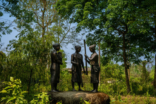 Person in the woods. Statue of Lachit Borphukan in Jorhat Assam. A memorial honouring General Lachit Borphukan. Near Kaziranga national park, Northeast India.