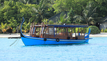 Fototapeta na wymiar wooden ships on the shore of a tropical island