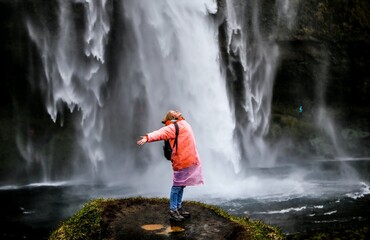 person in the waterfall