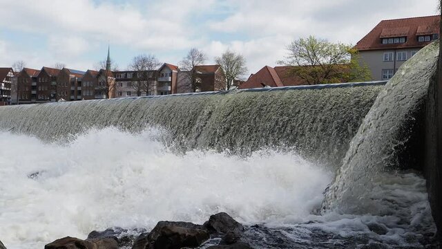 Waterfall on river Weser in city Hamelin in Germany