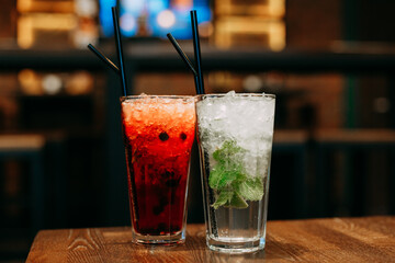 Mojito and current cocktail in glass
