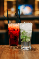 Mojito and current cocktail in glass