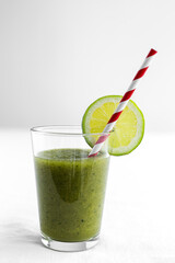 Homemade vegetable green smoothie with apple, cucumber, mint and lime
