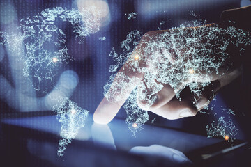 Double exposure of man's hands holding and using a phone and social network theme drawing.