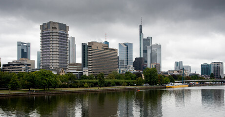 Fototapeta na wymiar Skyline of Frankfurt city the business centre of Germany with skyscrapers and the river Rhine