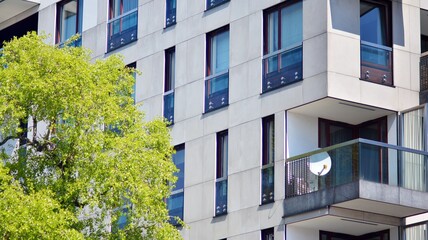 New modern architectural building house. Modern   facade of the apartment building.