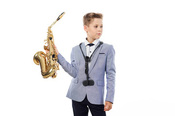Obraz premium boy musician playing saxophone performance isolated background