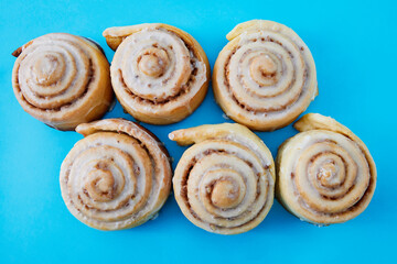 Delicious group of six glazed cinnamon rolls