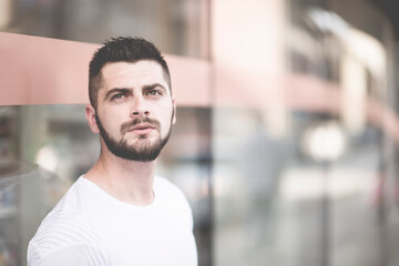 Close-up portrait of young bearded man 