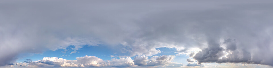 Seamless cloudy blue sky hdri panorama 360 degrees angle view with zenith and beautiful clouds for use in 3d graphics as sky dome or edit drone shot