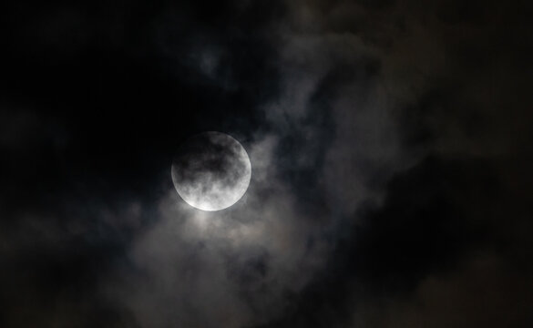 White Moon On Black Sky Background