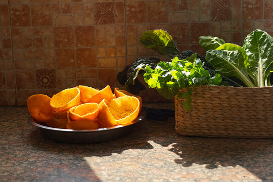 Orange peels ready to be used to make home-made cleaning agents 	