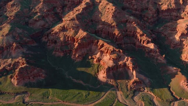 Aerial Drone Fly by Footage of The Red Rocks in Narman - Peribacalari Fairy Chimneys in the Narman province of Erzurum,TURKEY.