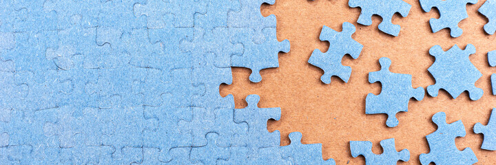 Panoramic image jigsaw puzzle with copy space. Connected and missing blank puzzle pieces. Business strategy Teamwork and problem solving concept