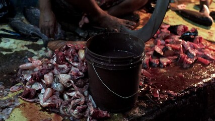 Unknown people selling fish at a street market on December 18, 2021 in the Chowringhee area of Kolkata, West Bengal, India
