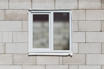 New plastic windows in an unfinished building