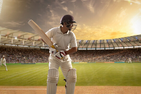  Cricketer, batsman ready to face the ball on the stadium	