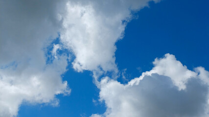 Powerful looking clouds against a bright blue sky